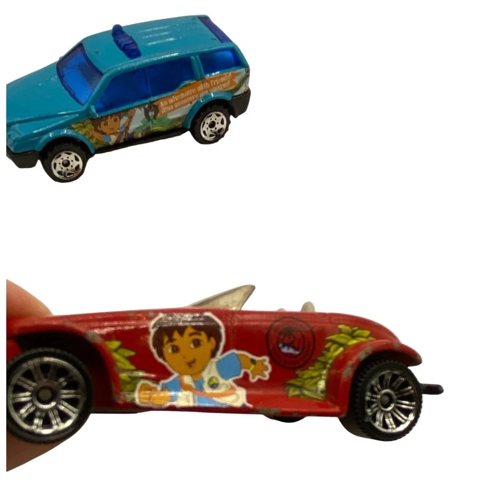 Lot of 2 Matchbox Dora the Explorer Diego Blue SUV Red‎ Plymouth Prowler Cartoon